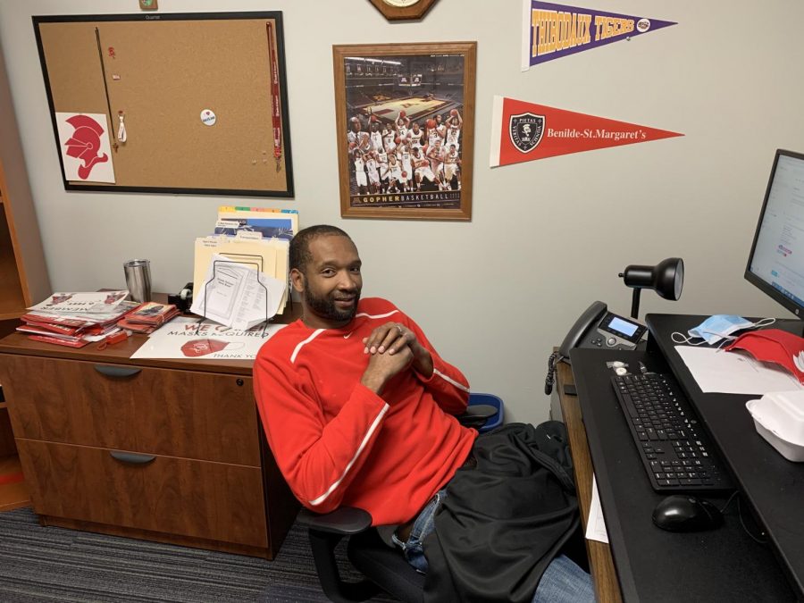 Mr. Damian Johnson spends his school days working in the Admissions Office and his nights coaching Red Knight basketball.
