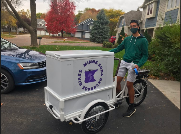 Senior Nate Charles prepares for the incoming success of his business, Minne-Soda Beverage Bikes.
