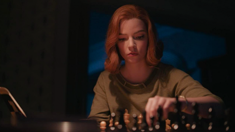 Beth Harmon (Anya Taylor-Joy) prepares for a chess tournament. 