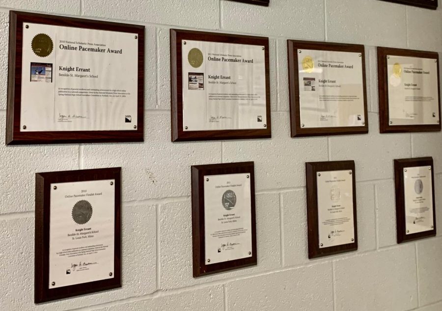 Pacemaker plaques decorate the wall of the Knight Errant classroom.