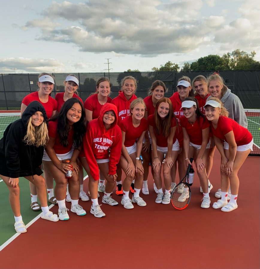 The BSM girls tennis team poses for a picture post win.