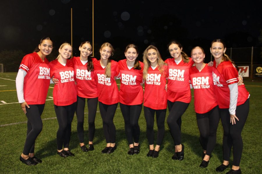 The senior Knightettes on the BSM football field.