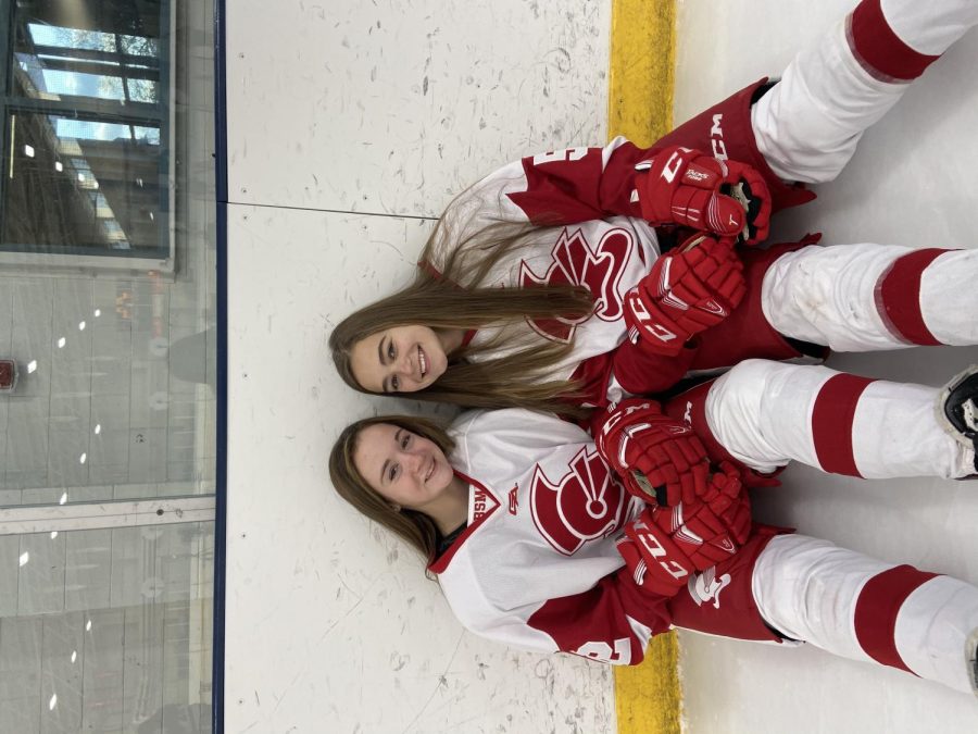 New Benilde- St. Margarets hockey captains Abby Garvin 23 and Annie Juckniess 23.