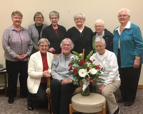 Sister Jeanne Marie surrounded by her Benedictine sisters at the College of St. Benedict.