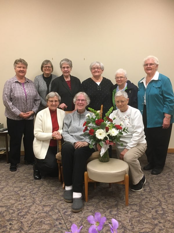 Sister Jeanne Marie surrounded by her Benedictine sisters at the College of St. Benedict.