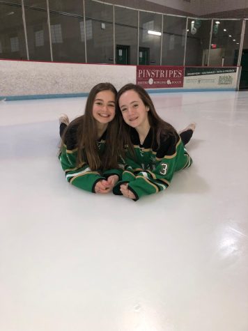Annie Juckniess 23 (left) and Abby Garvin (right) 23 pose in their Edina U15A uniforms at Braemar ice arena.