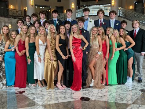 A group of juniors at photos before attending prom.
