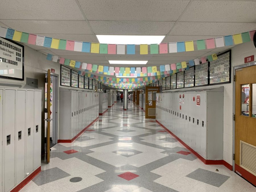 Prayer+flags+hang+in+the+main+hallway+in+remembrance+of+Dan+Bowler.