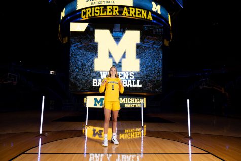 Olivia Olson at the University of Michigan after committing to play womens basketball.