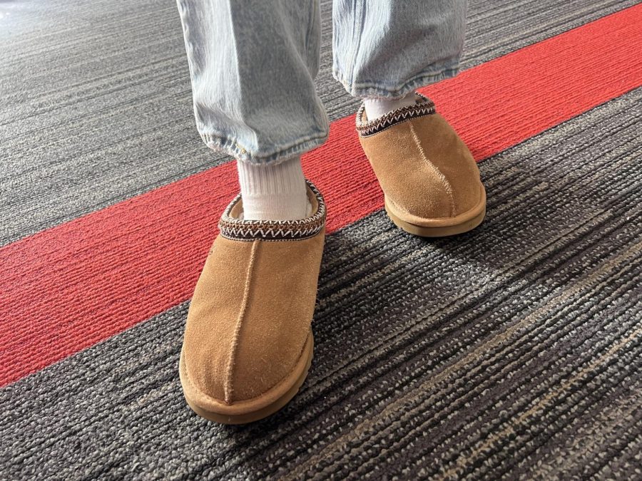 Ugg slippers are being worn inside and outside the house this winter for a cozy fashion statement.