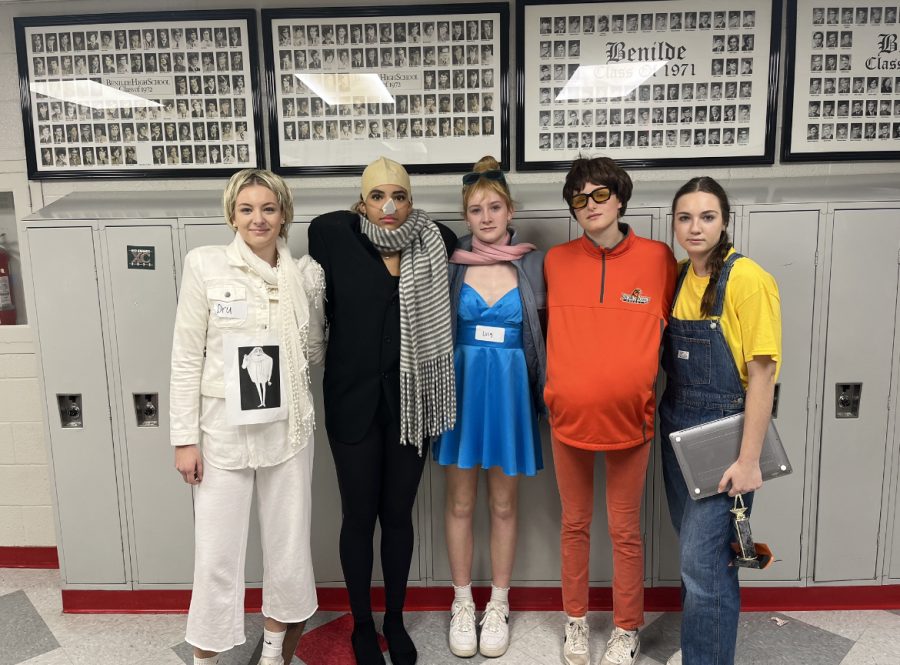 The girls volleyball team dressed up as characters from the Despicable Me movie the day of their section finals game.