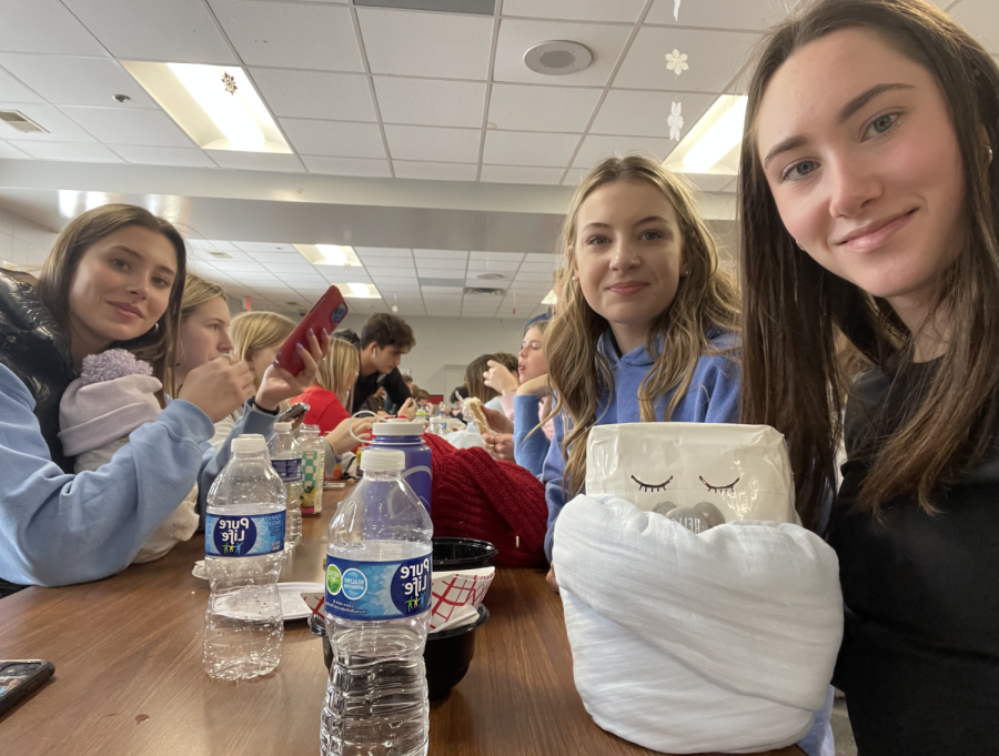 BSM Seniors enjoy lunch while taking care of their flour babies