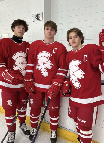 2022-2023 BSM Boys hockey captains, Ryan Baird, Peter Giertsen, and Drew Stewart.