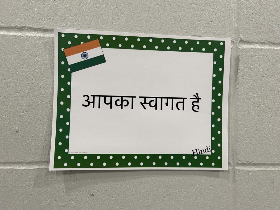Signs around the school say Welcome in various languages.