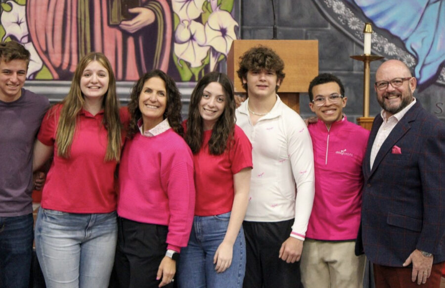 The Taylor family and friends wear pink to support the Abbeys Hope foundation during the Easter Mass Common Basket.