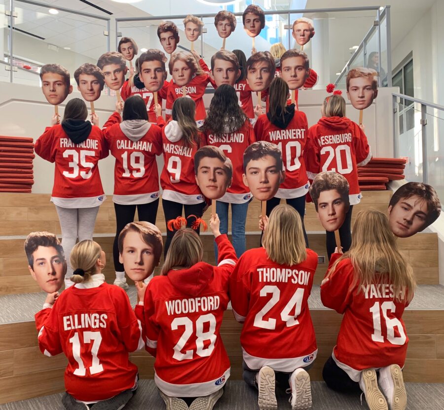 An+old+group+of+hockey+superfans+%28BSM+class+of+20%29+represents+their+respective+player+with+a+matching+jersey+and+big-head+cutout.