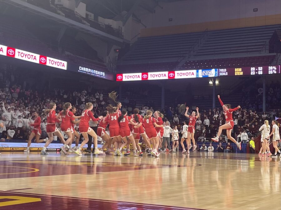 The BSM Girls Basketball team celebrates after beating Stewartville to win the state championship.