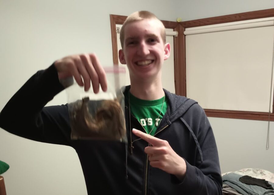 Steven+Tangney+with+a+bag+containing+the+hair+that+he+donated.