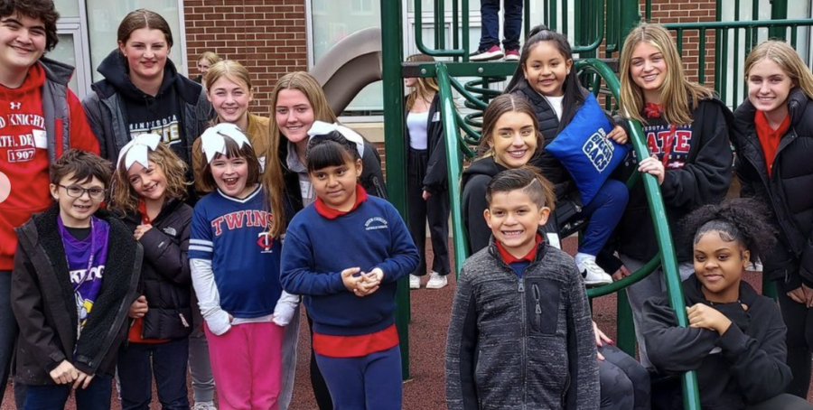 Spanish III students played on the playground with their elementary buddies at Risen Christ Catholic School