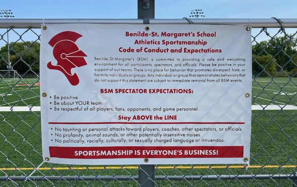 The Above the Line Policy is posted at the football field to remind fans to stay positive
