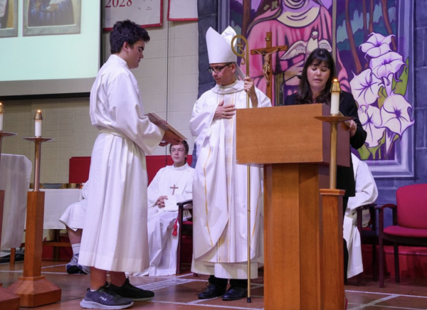 The new BSM president Danielle Hermanny was sworn in by Bishop Izen.