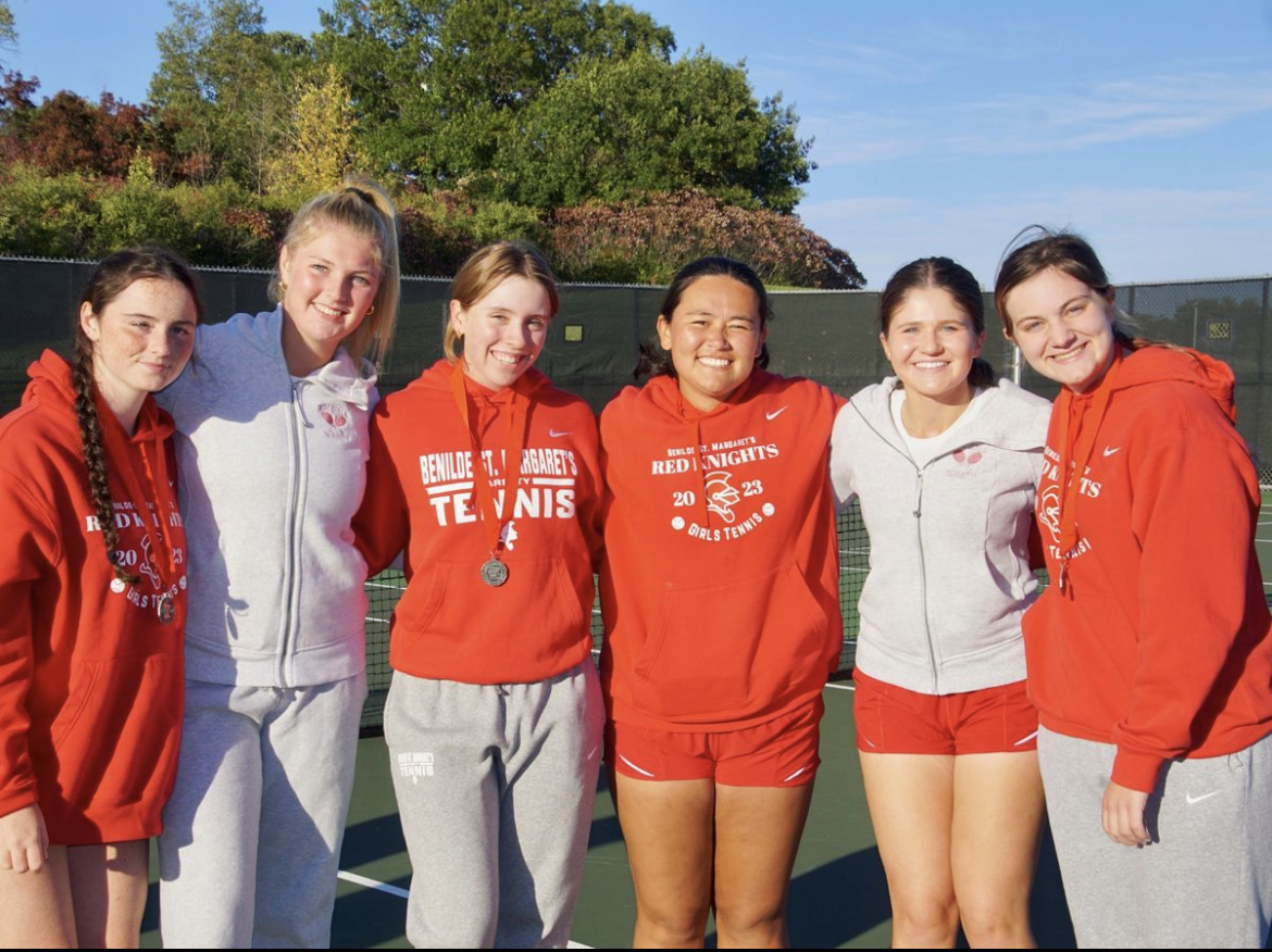 BSM Girls Tennis Seniors celebrate their success on the team.