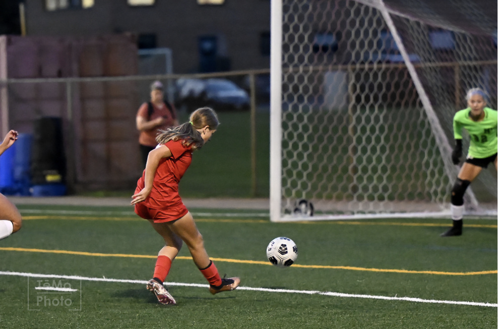 Soccer freshman standout, Aida Parker, shooting in their game vs. New Prague this past fall.