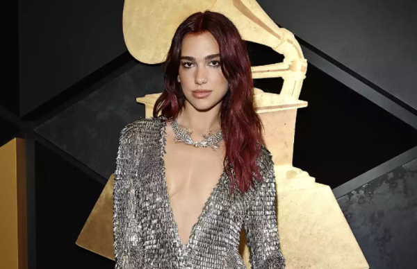 Dua Lipa revives the ovary cutout trend in her stunning custom Courreges gown.