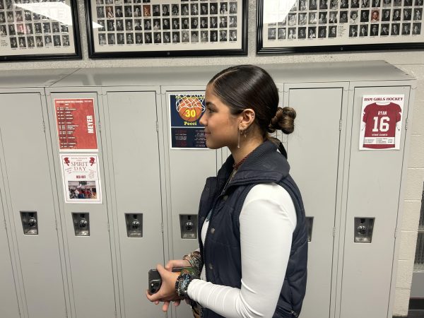 Senior, Maria Chehin displays her stylish slick back bun in the BSM hallways.