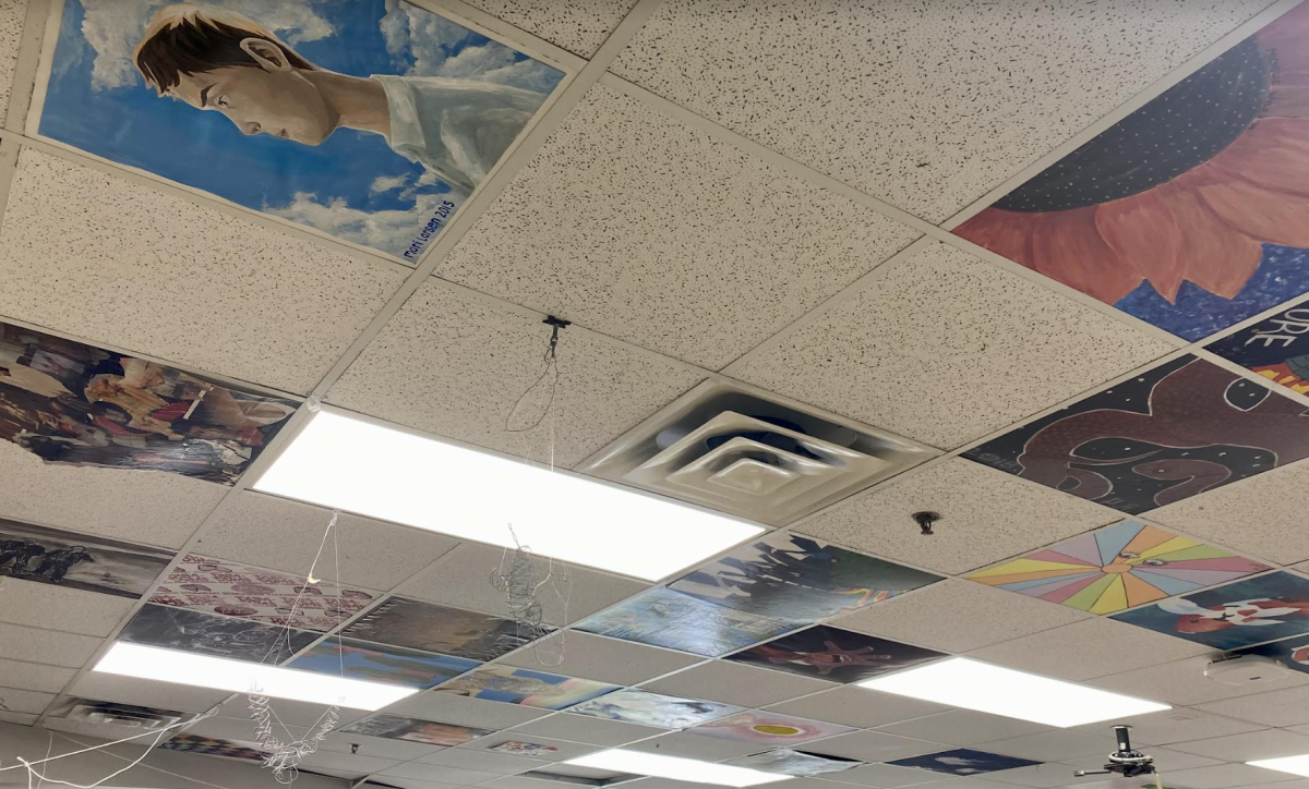 Kelli+Rahn+continues+the+tradition+of+allowing+each+senior+artist+to+decorate+a+ceiling+tile.