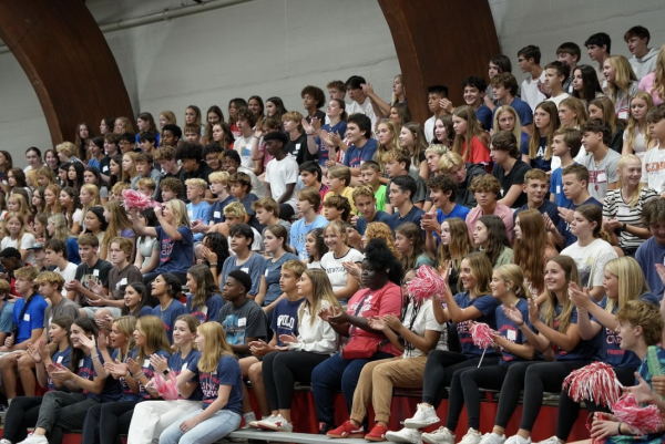 The freshman sitting in the great hall on their orientation day. 

