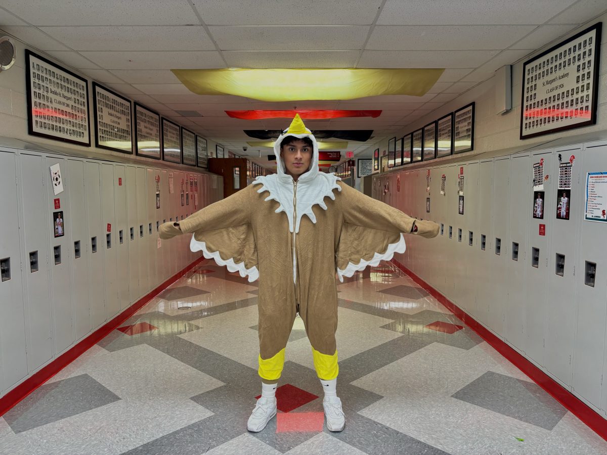 Eli McLaughlin showing off his halloween spirit in his eagle costume 