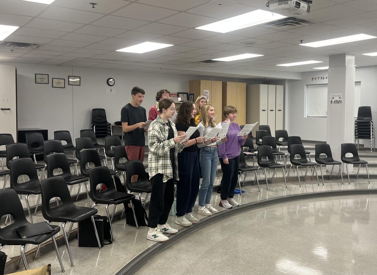 BSM's Red Knotes choir class rehearses with small numbers of due to a lack of enrollment of music, but their energy remains high and positive.