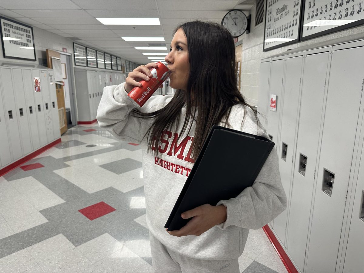 Junior Kali Kosek fuels up for the rest of the school day with a watermelon Red Bull. 