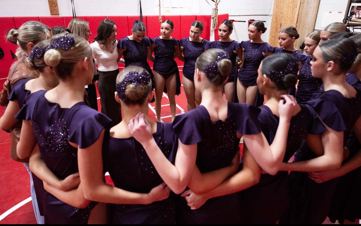 The Benilde St. Margaret's dance team focused together before winning the conference championship. 