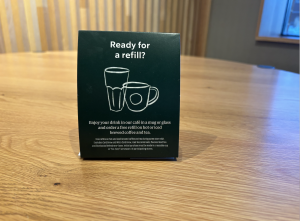 Ready for a refill signs are placed on Starbucks' tables to inform customers about the new policy.