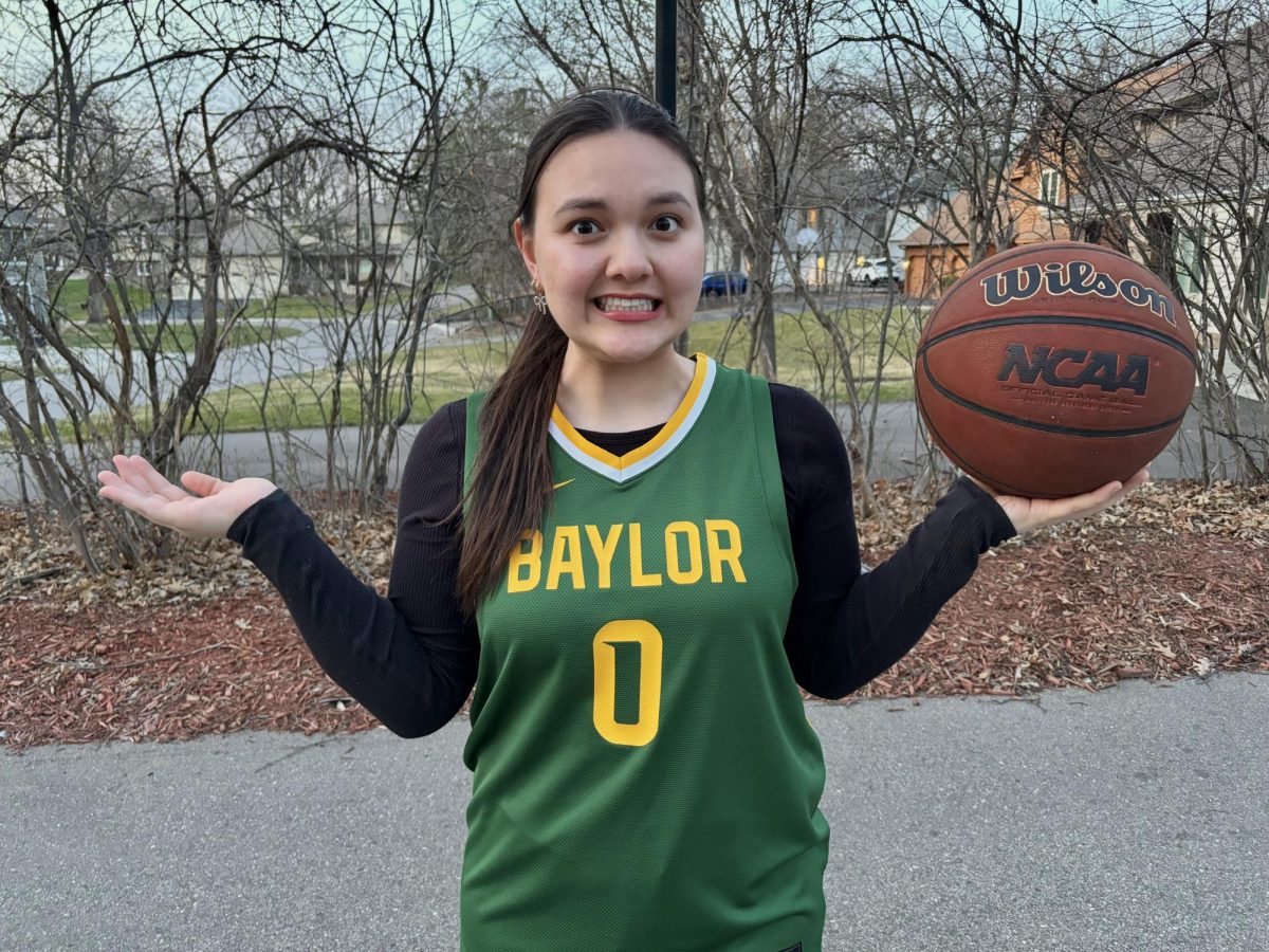 I have no idea what I am doing when it comes to March Madness (yes, I bought a jersey and a basketball just for this picture). 