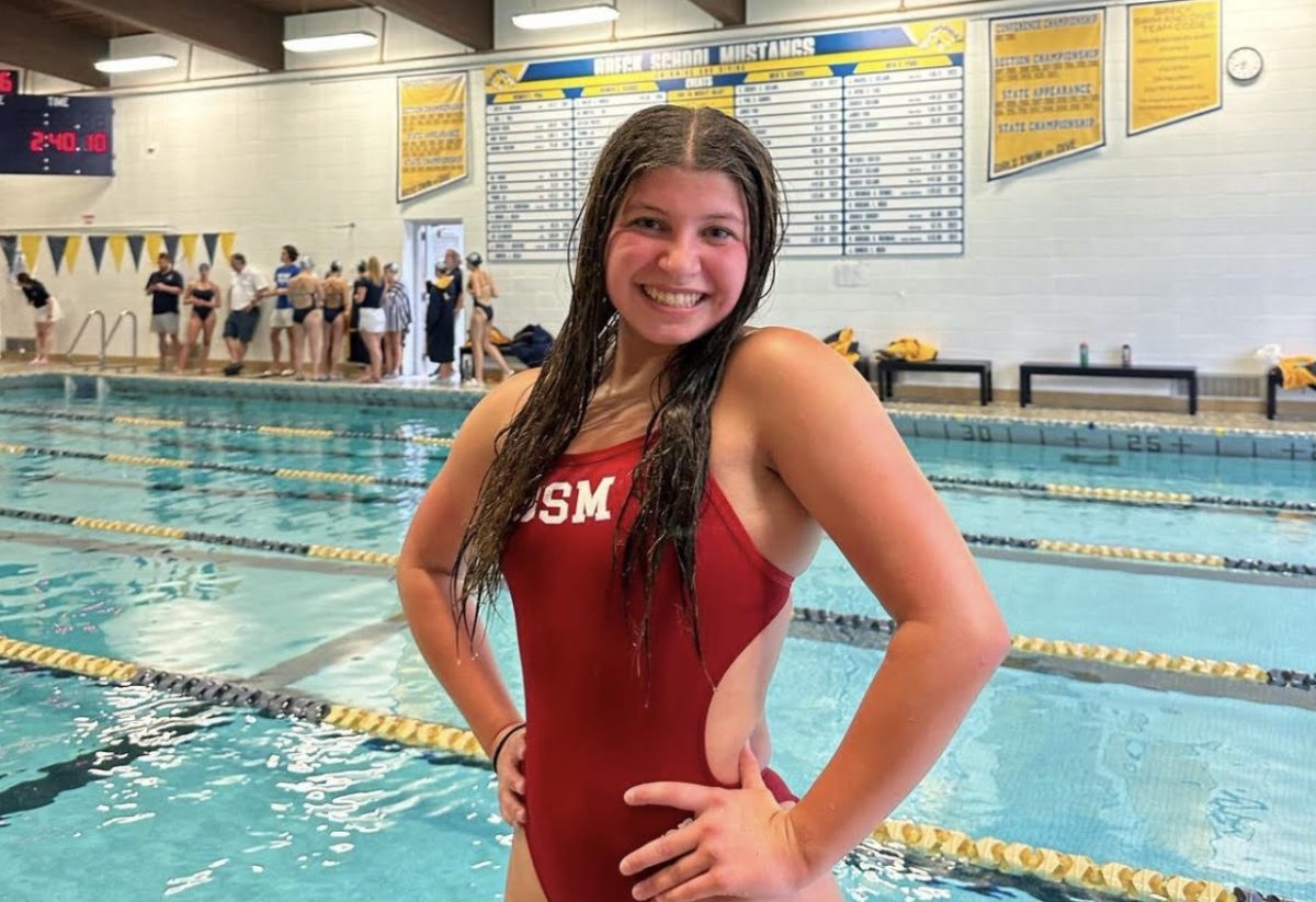 Rudowsky ends her high school swimming career with a championship.