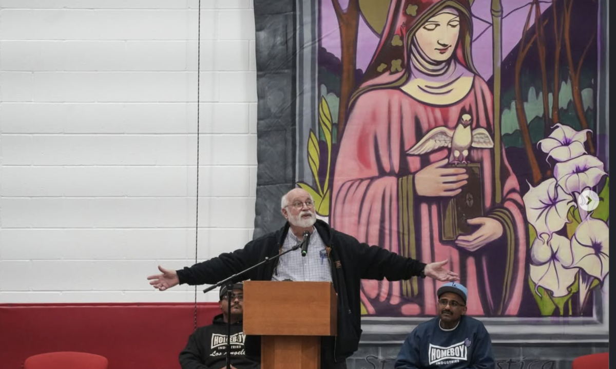 Father Greg Boyle delivers a speech during social justice week to BSM students about his inspiration in creating Homeboy Industries.