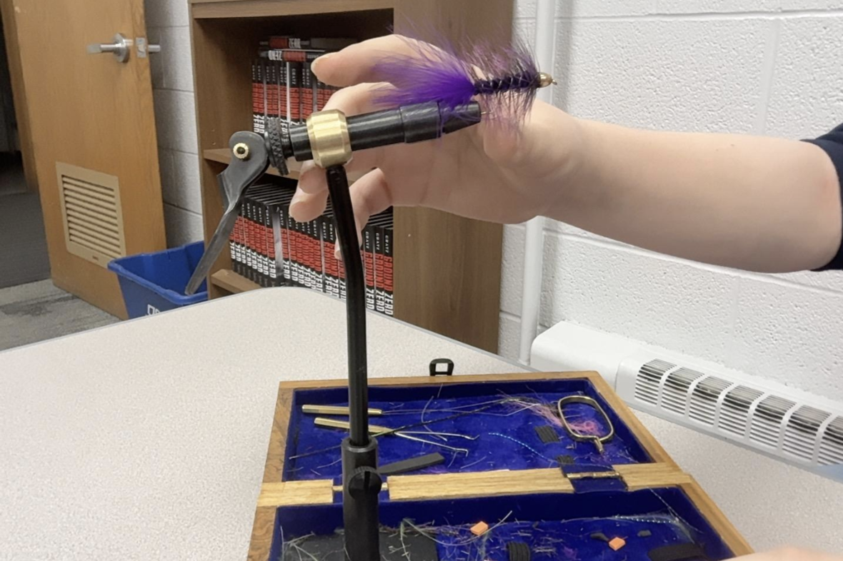One wellness activity is fly tying with Greg Hoemke, a 7th-grade literature teacher.