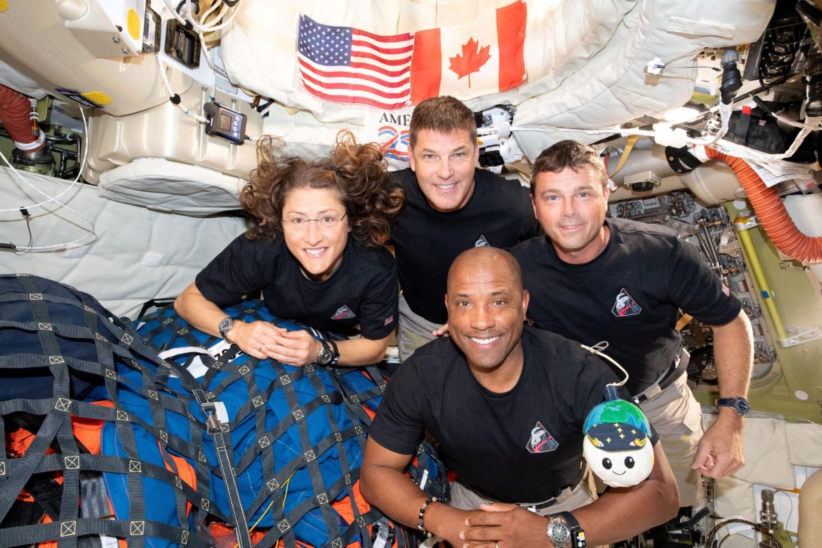 Astronauts Reid Wiseman, Victor Glover, and Christina Koch, and Jeremy Hansen in the Orion Spacecraft.